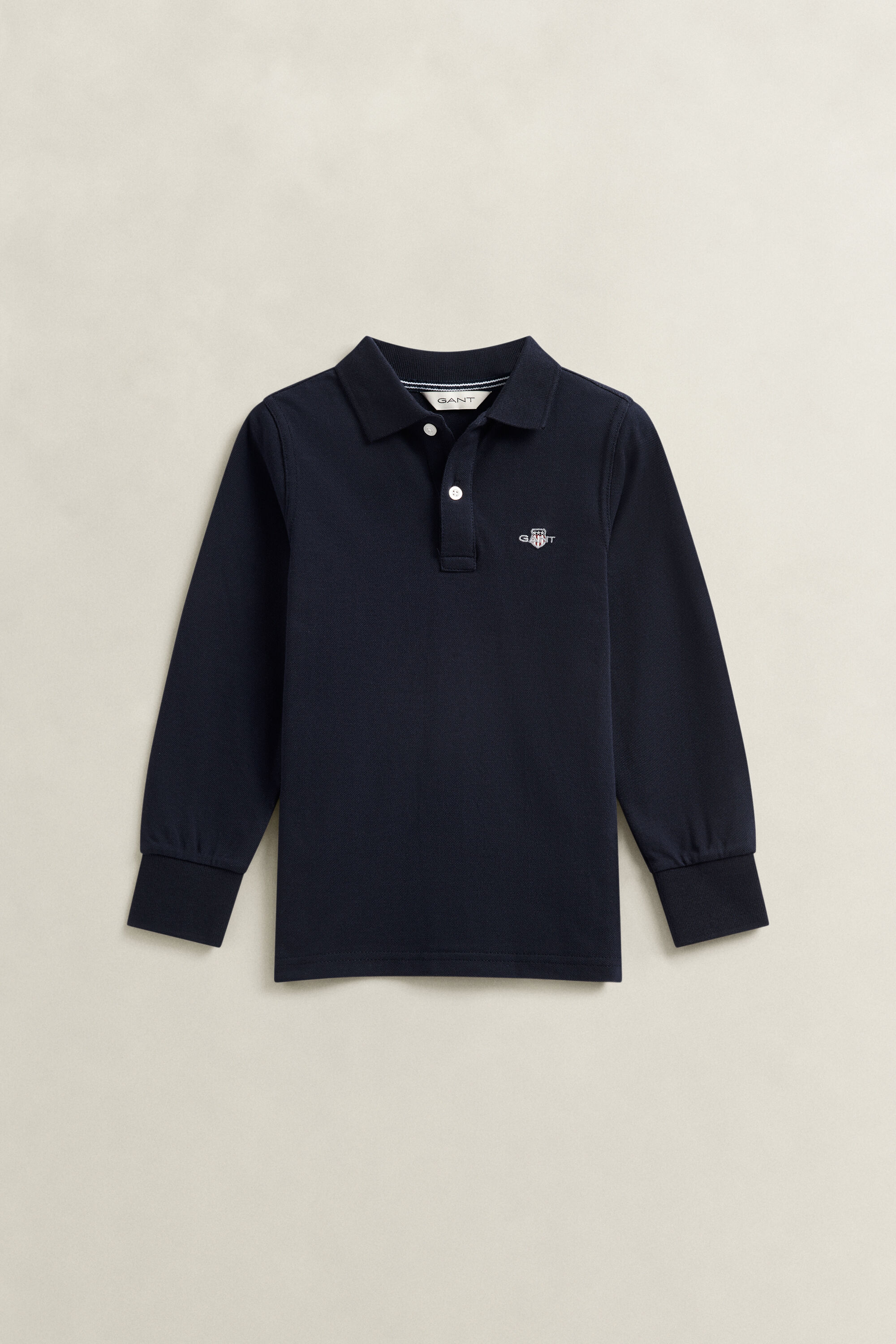 Poloshirt met lange mouwen en schild voor jongens