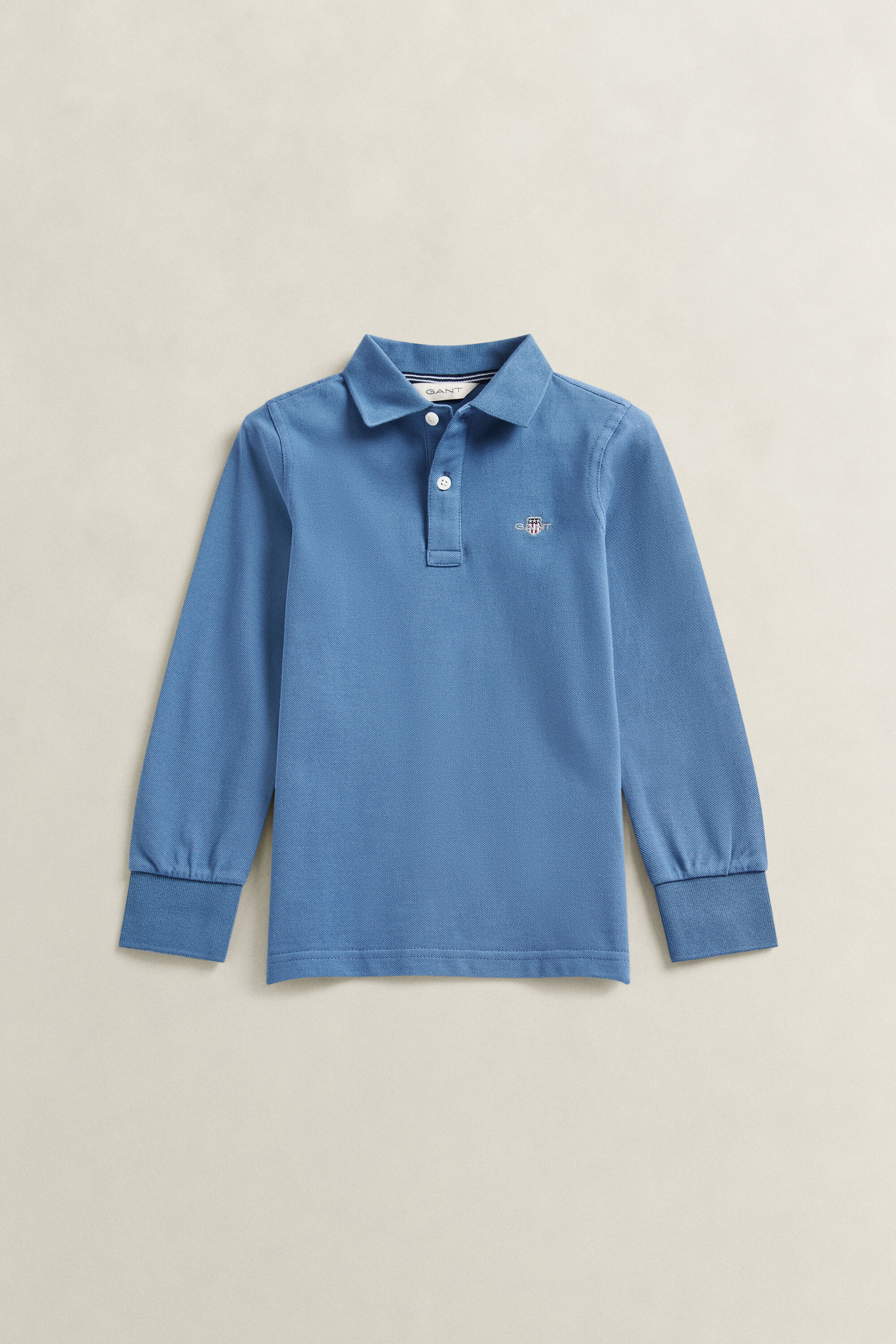 Poloshirt met lange mouwen en schild voor jongens