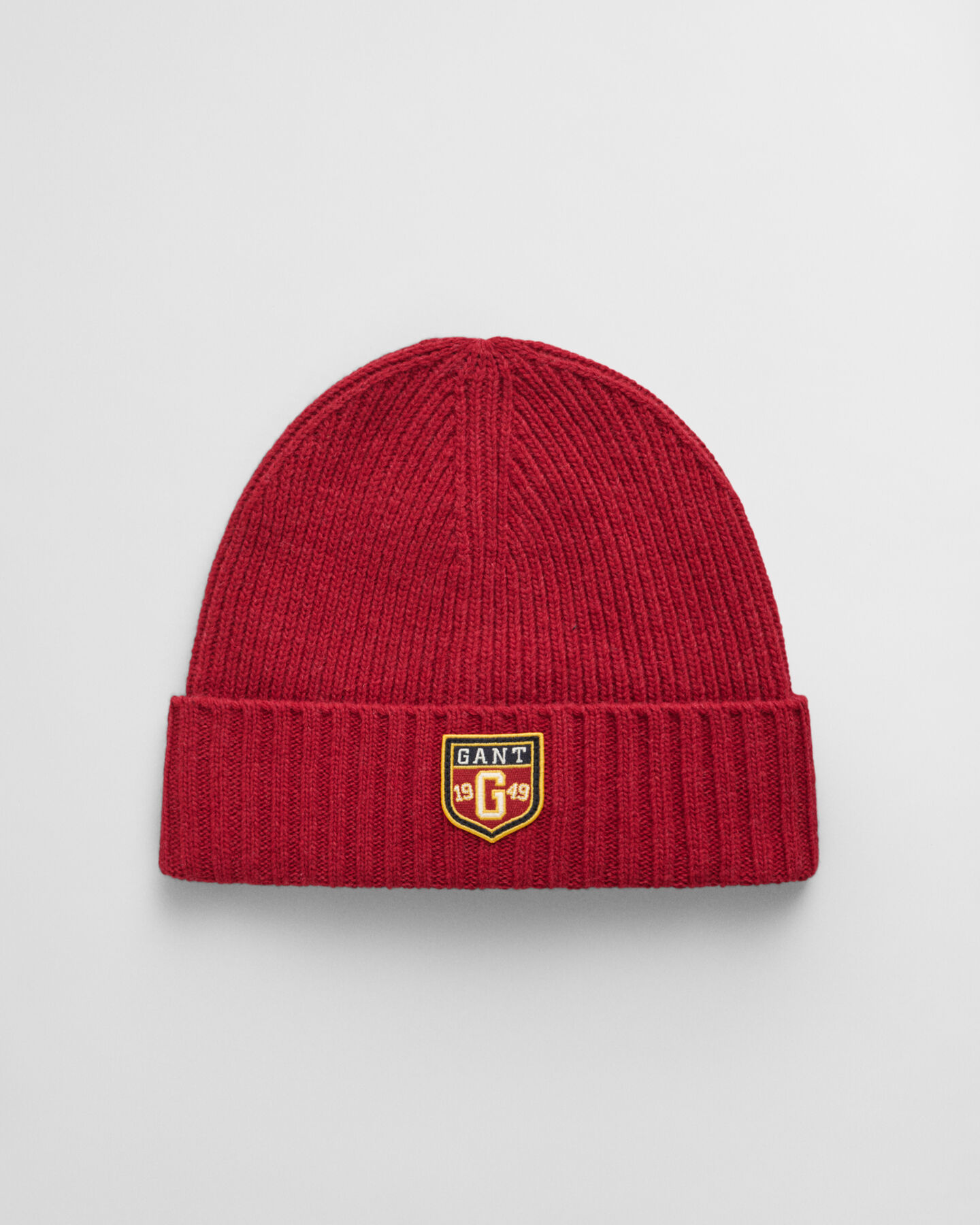 Wollen beanie met badge