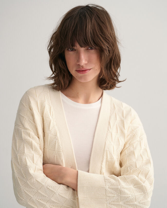 Vest met V-hals en visgraatmotief