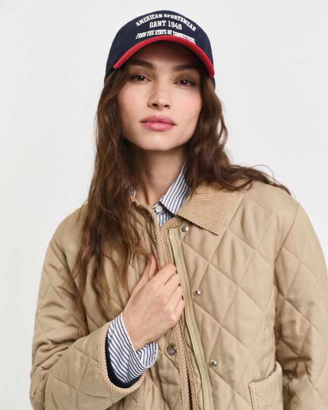 Gewatteerd jack met corduroy details