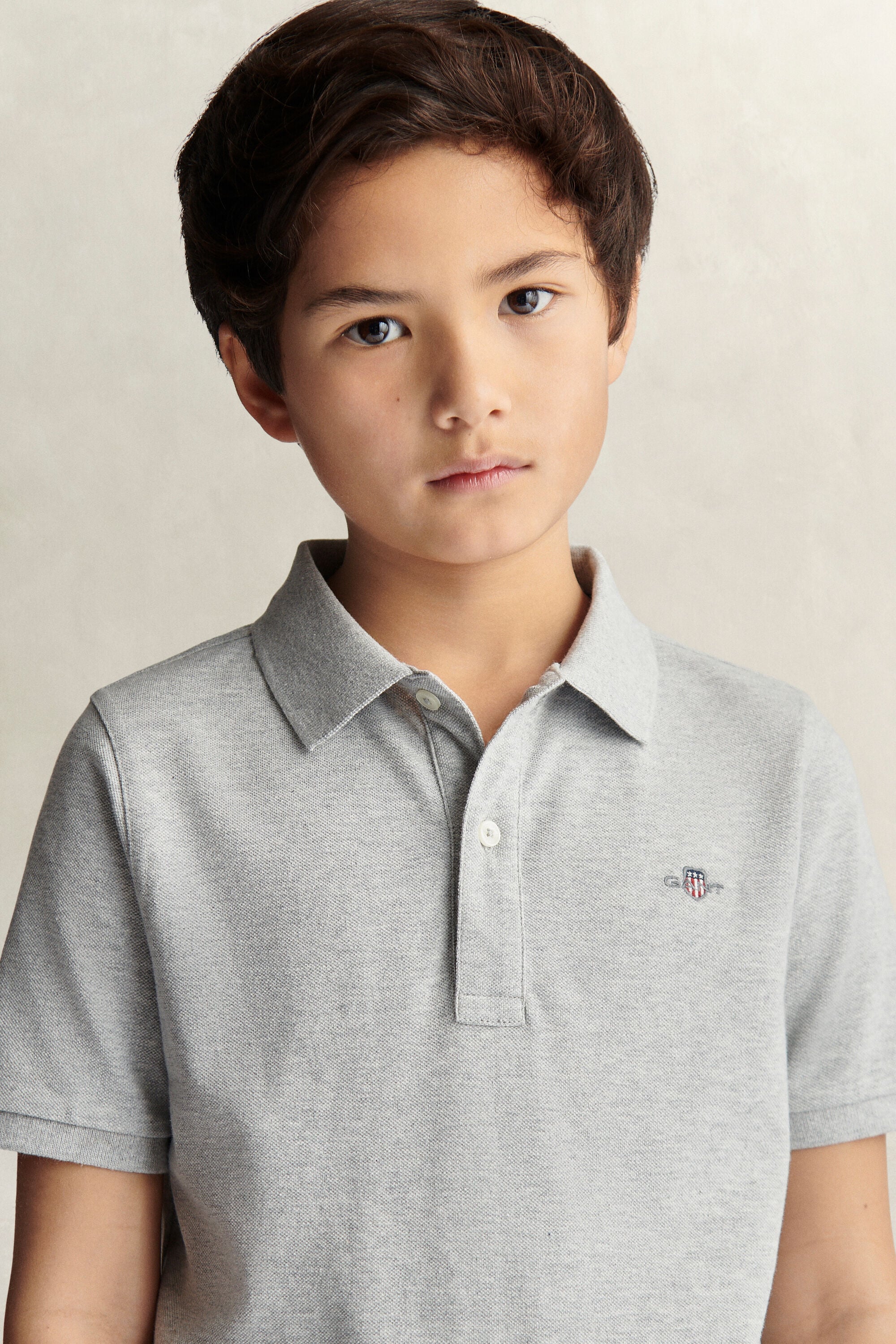 Poloshirt met schild voor tieners