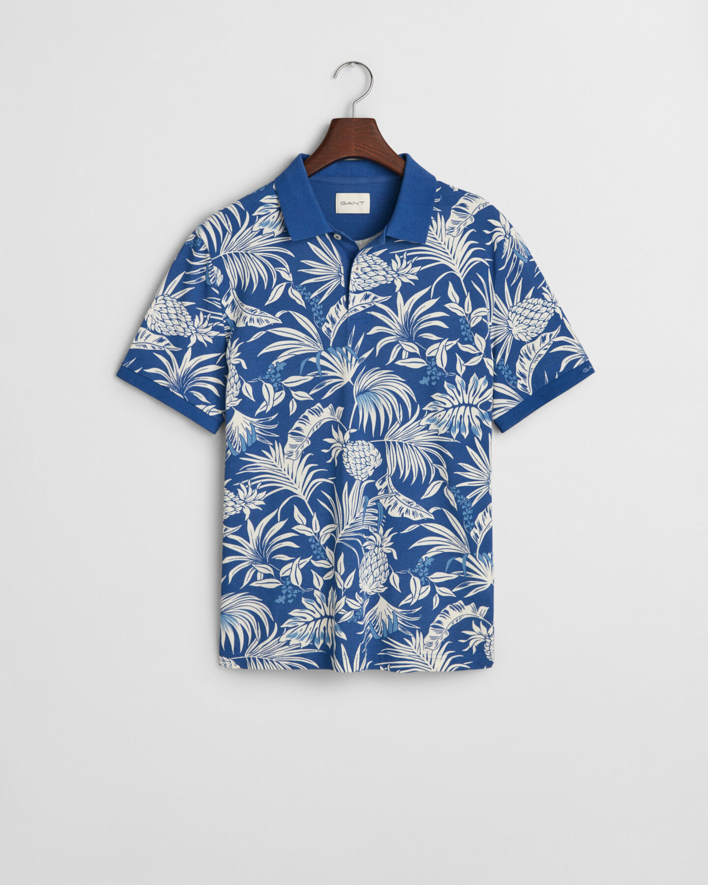 Poloshirt met tropische print
