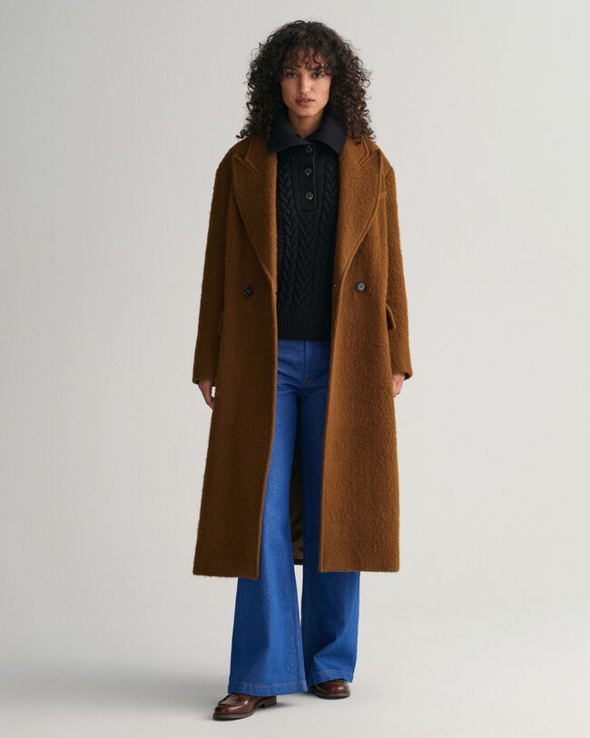 Gebreide coltrui met kabels en knopen