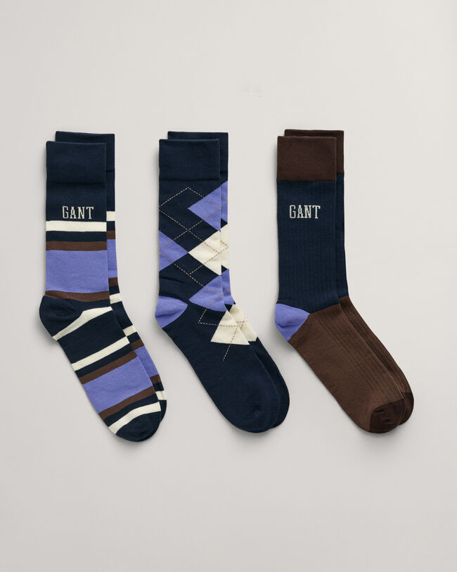 Drie paar Argyle en gestreepte sokken in cadeauverpakking