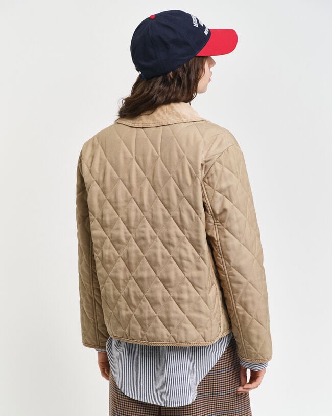 Gewatteerd jack met corduroy details
