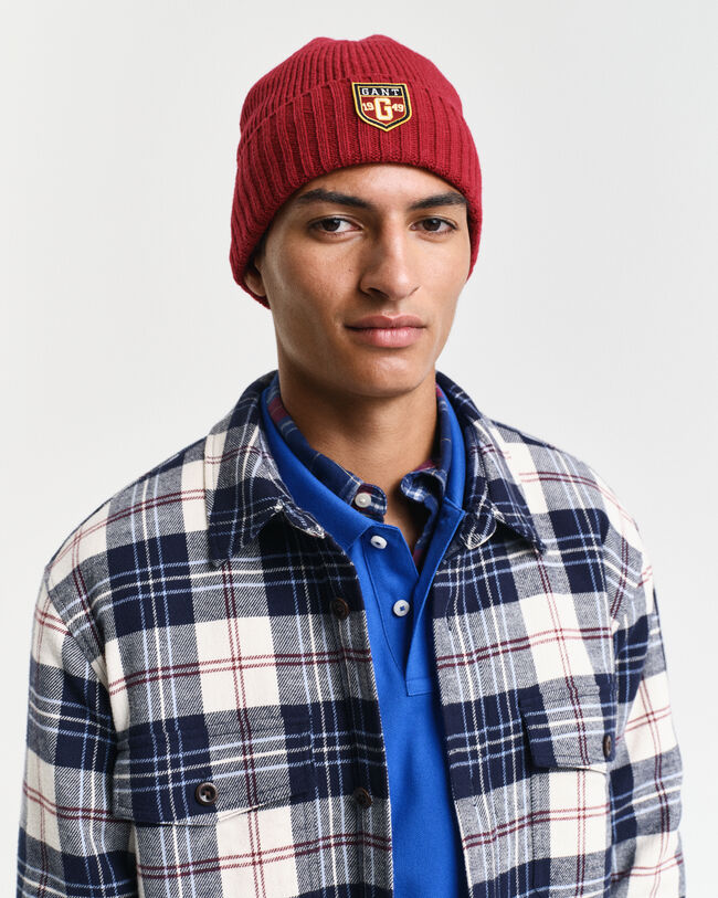 Wollen beanie met badge