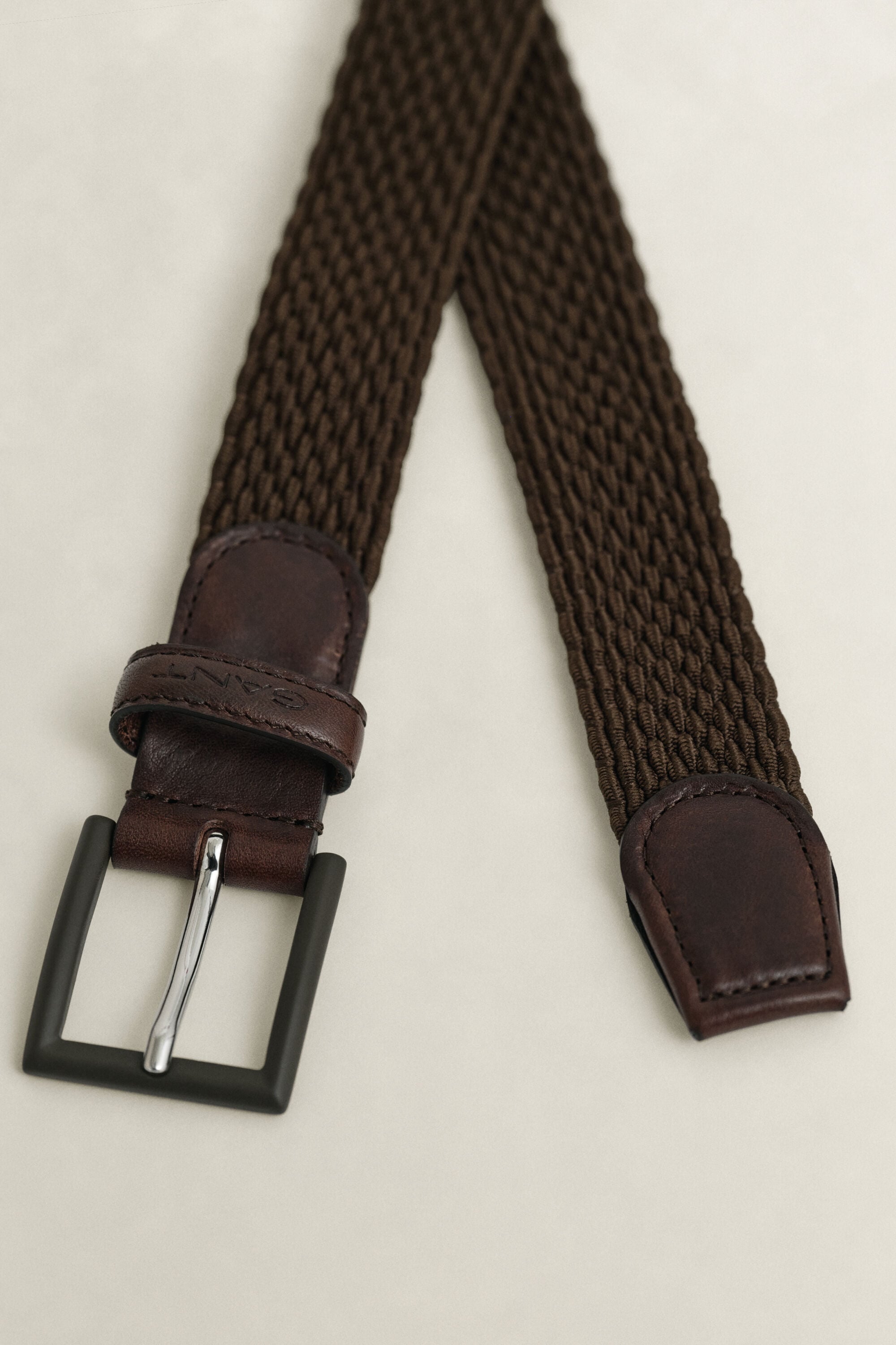 Gevlochten ton sur ton riem
