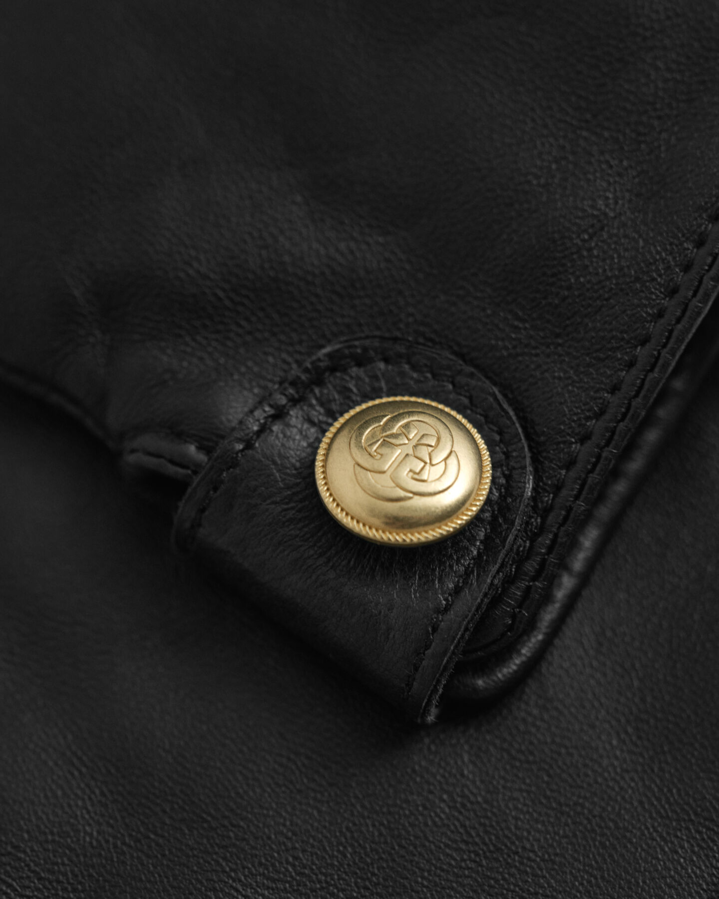 Leren handschoenen met knopen