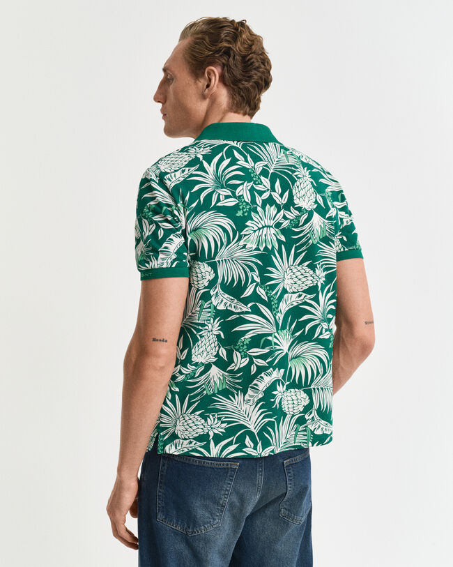 Poloshirt met tropische print