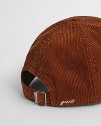 Corduroy pet met G-badge