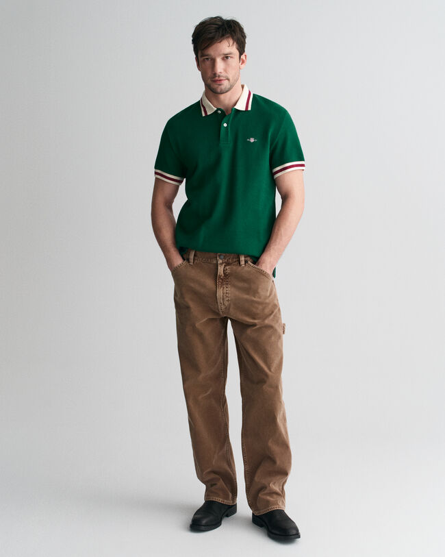 Piqu&eacute; poloshirt met popcorntextuur