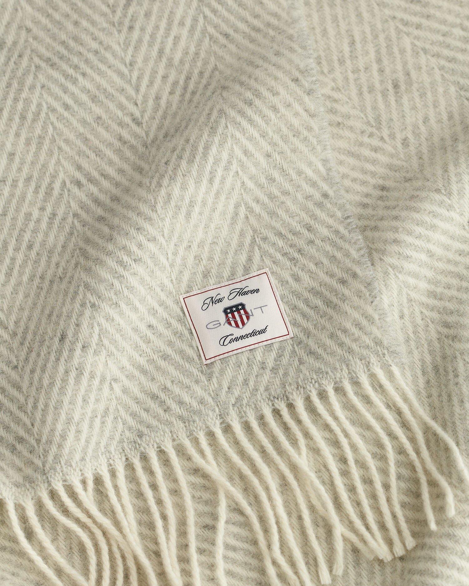 Wollen sprei met visgraatmotief