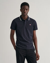 Piqu&eacute; poloshirt met contrasterende kraag met streepjes