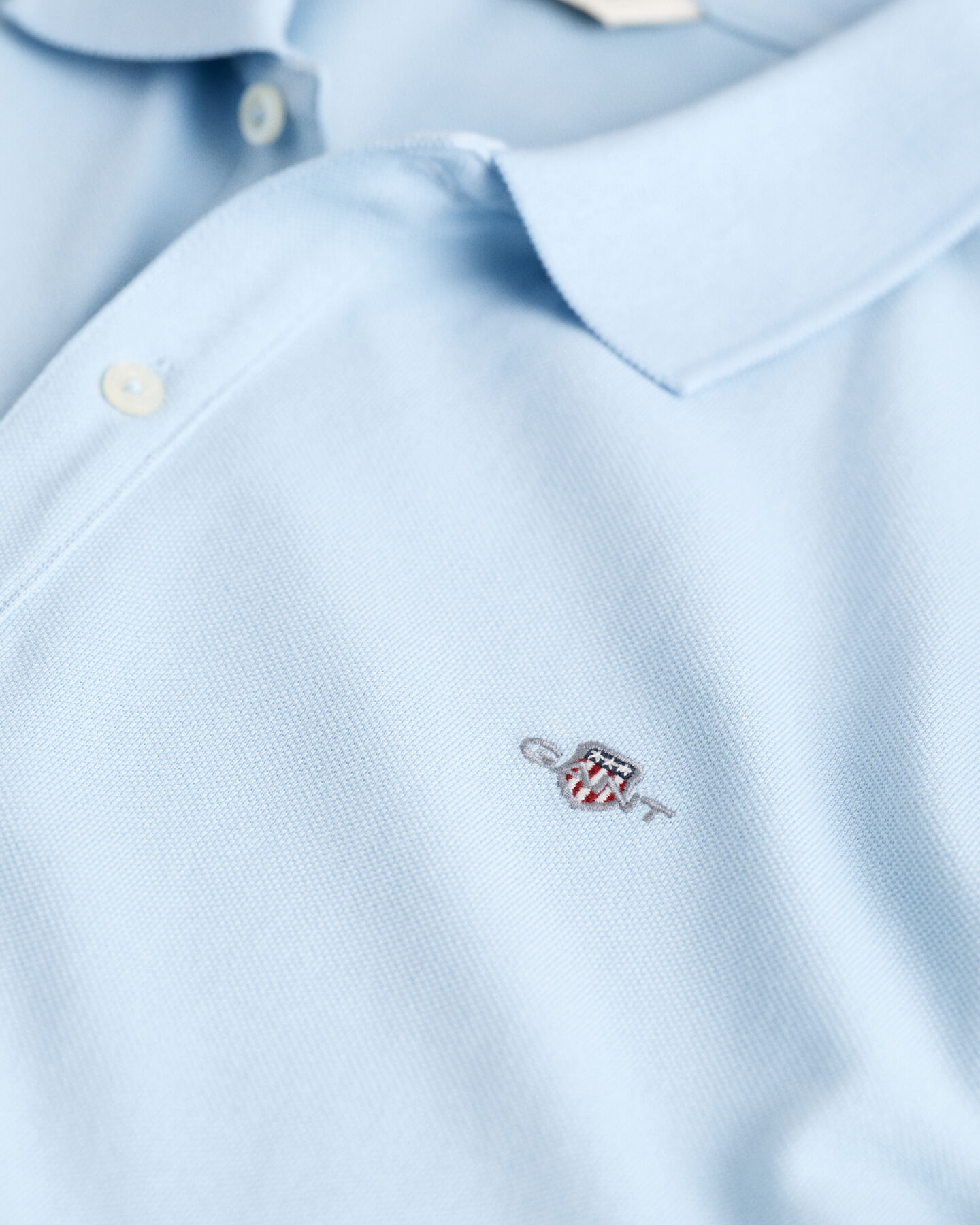 Teens Shield piqué poloshirt