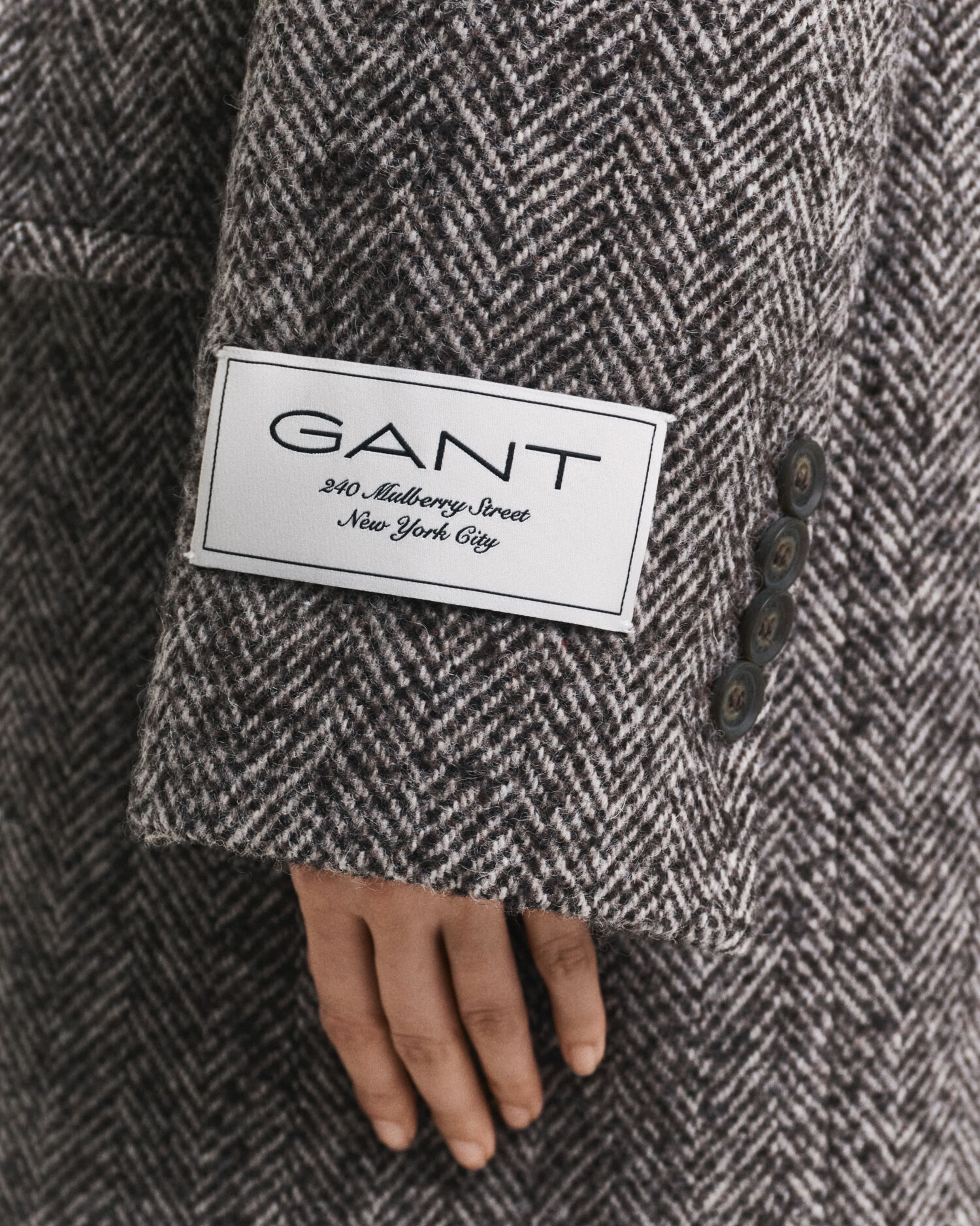 Overjas van wolmix met visgraatmotief