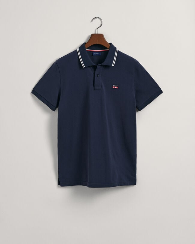 Piqu&eacute; poloshirt met contrasterende kraag met streepjes
