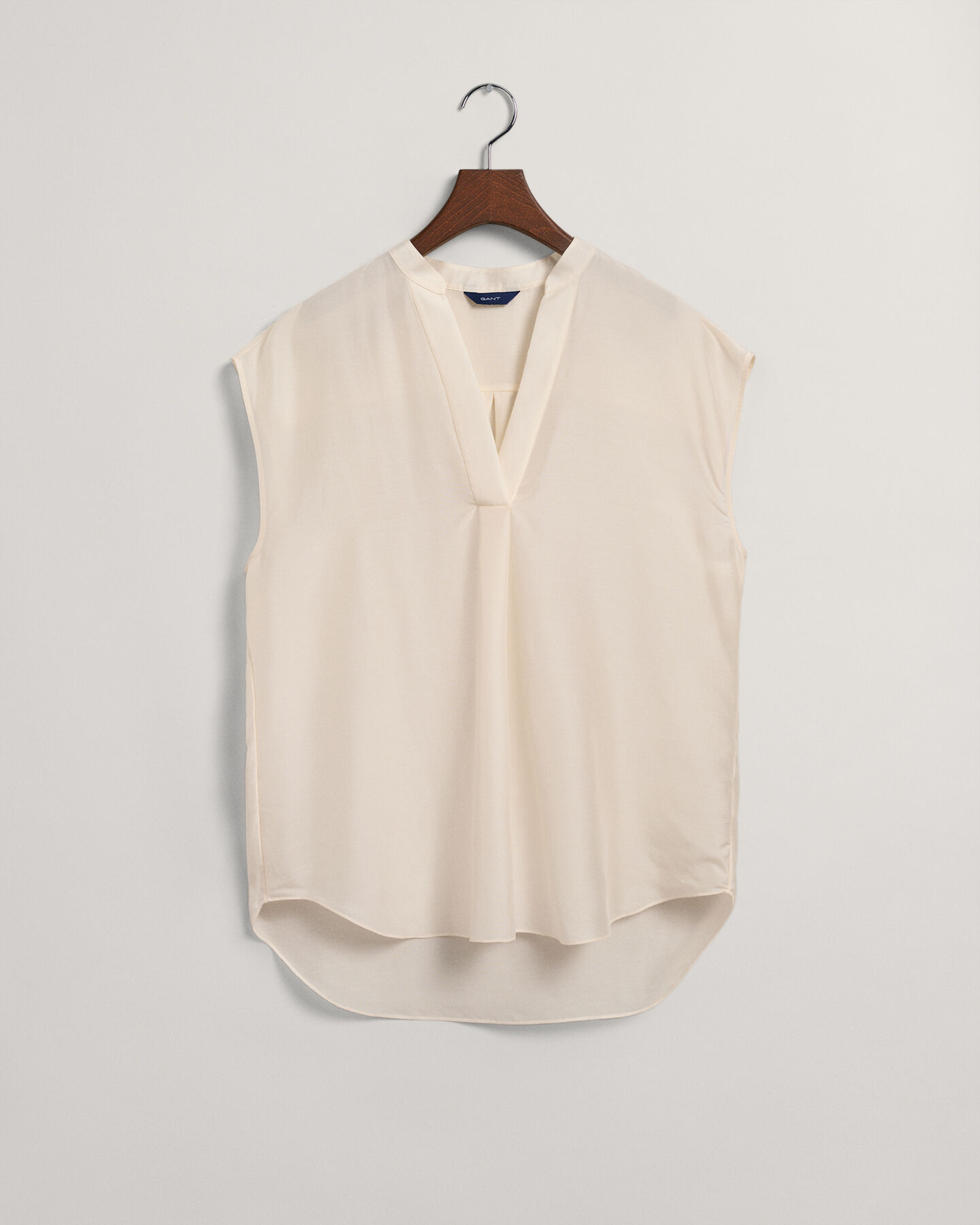Mouwloze blouse met opstaande kraag