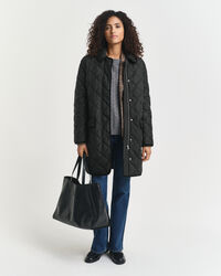 Gewatteerde jas met corduroy details