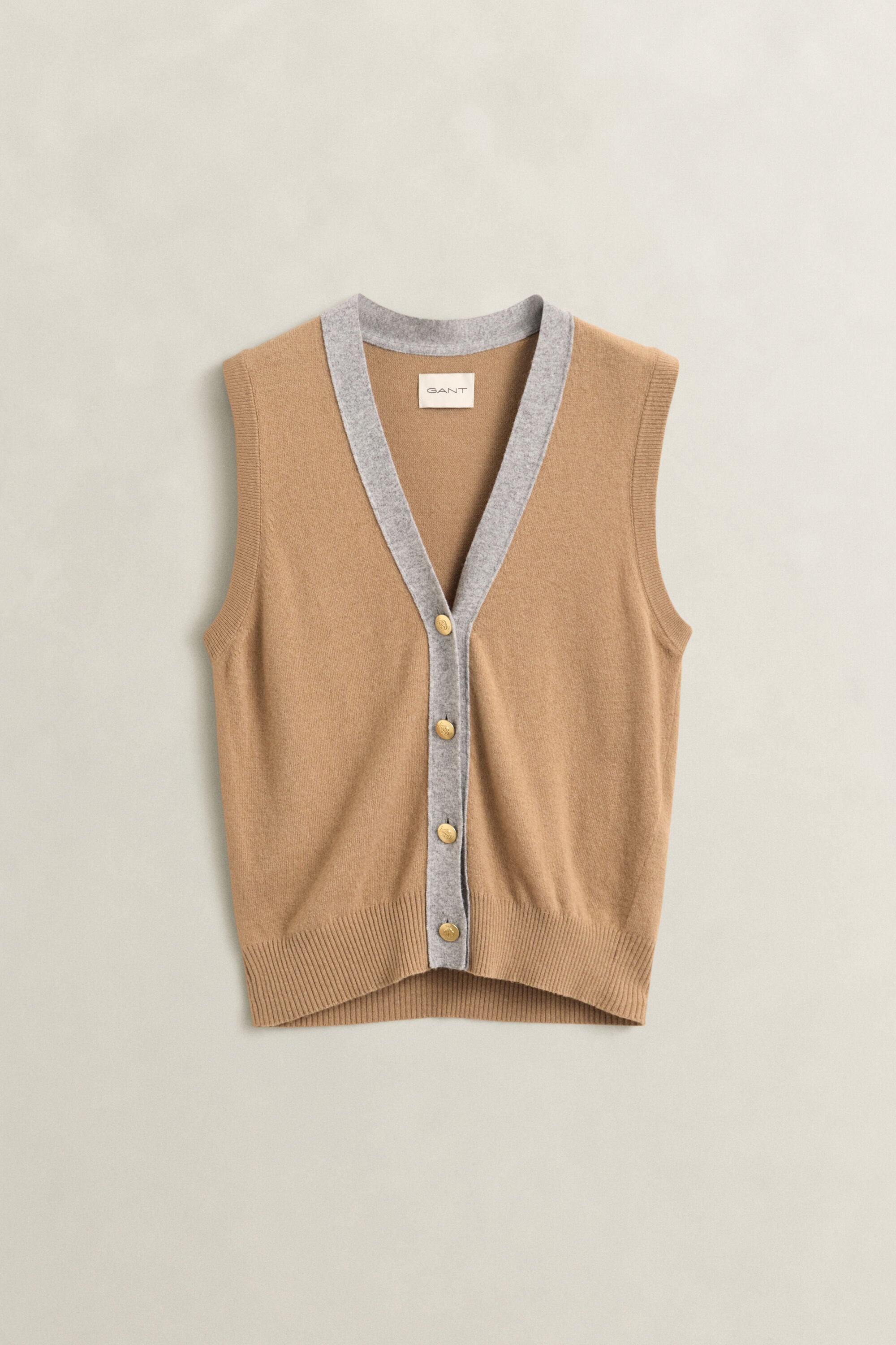 Gebreide spencer met contrasterende details