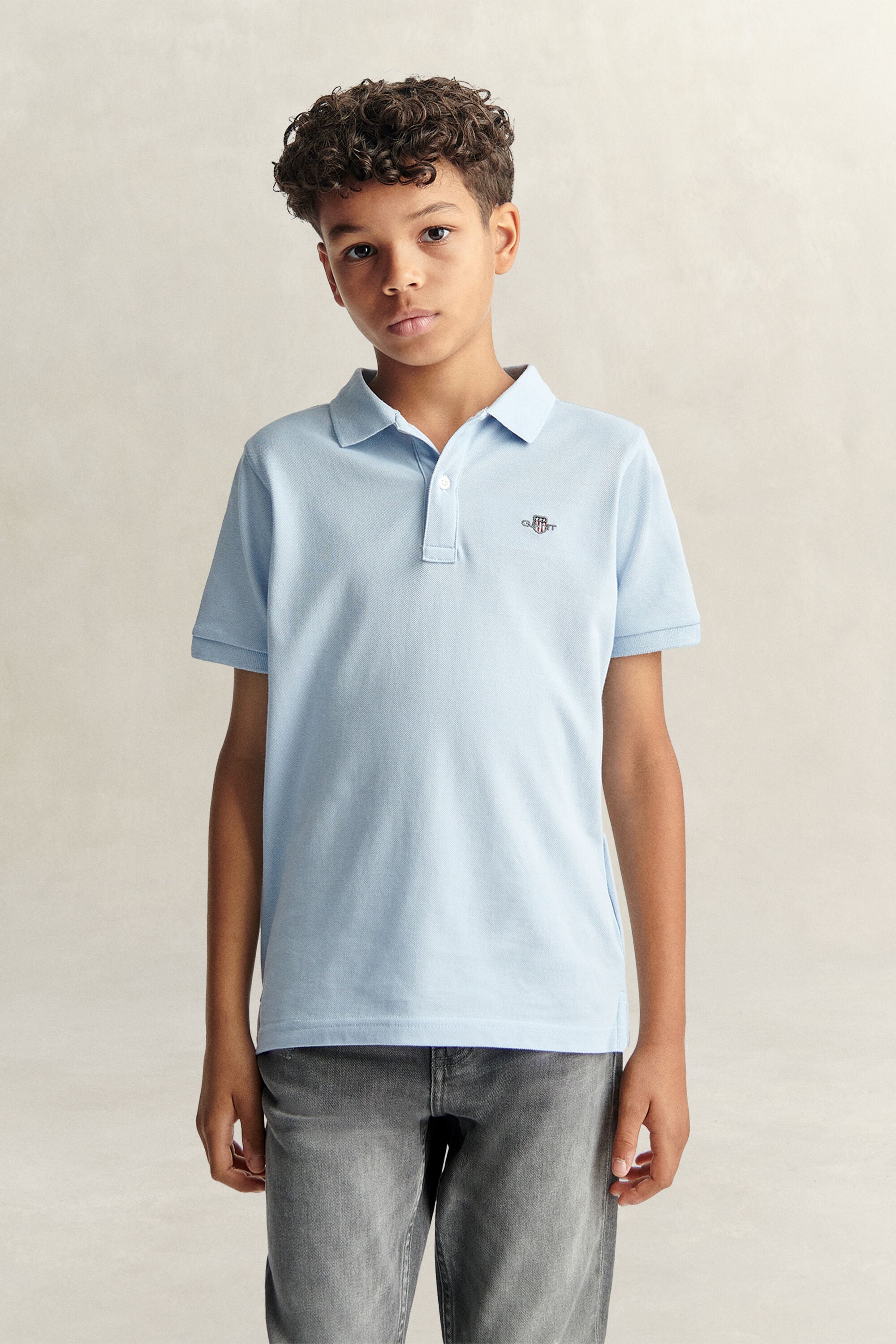 Poloshirt met schild voor tieners