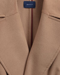 Jas van wolmix met ceintuur