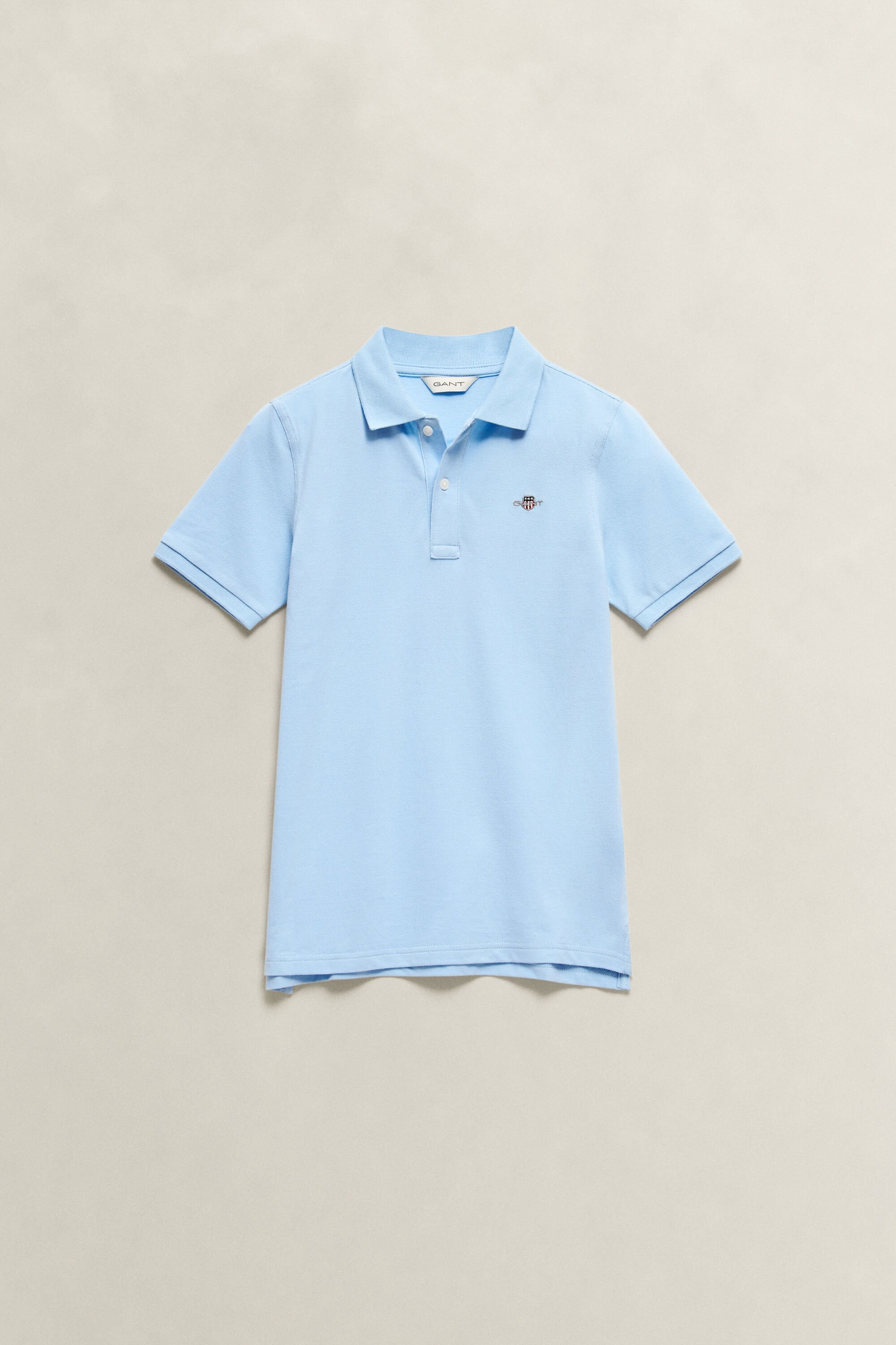 Teens Shield piqué poloshirt