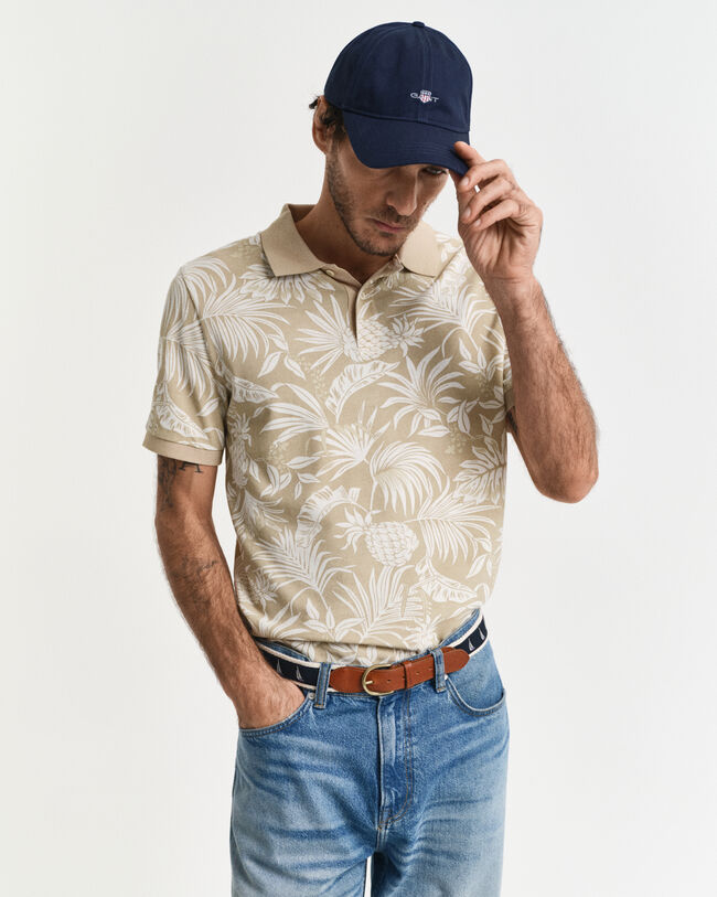 Poloshirt met tropische print