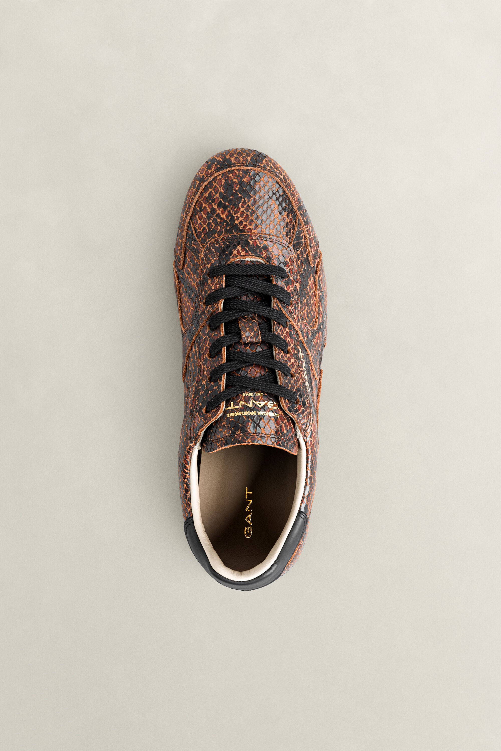 Sperly leren sneakers met slangeneffect