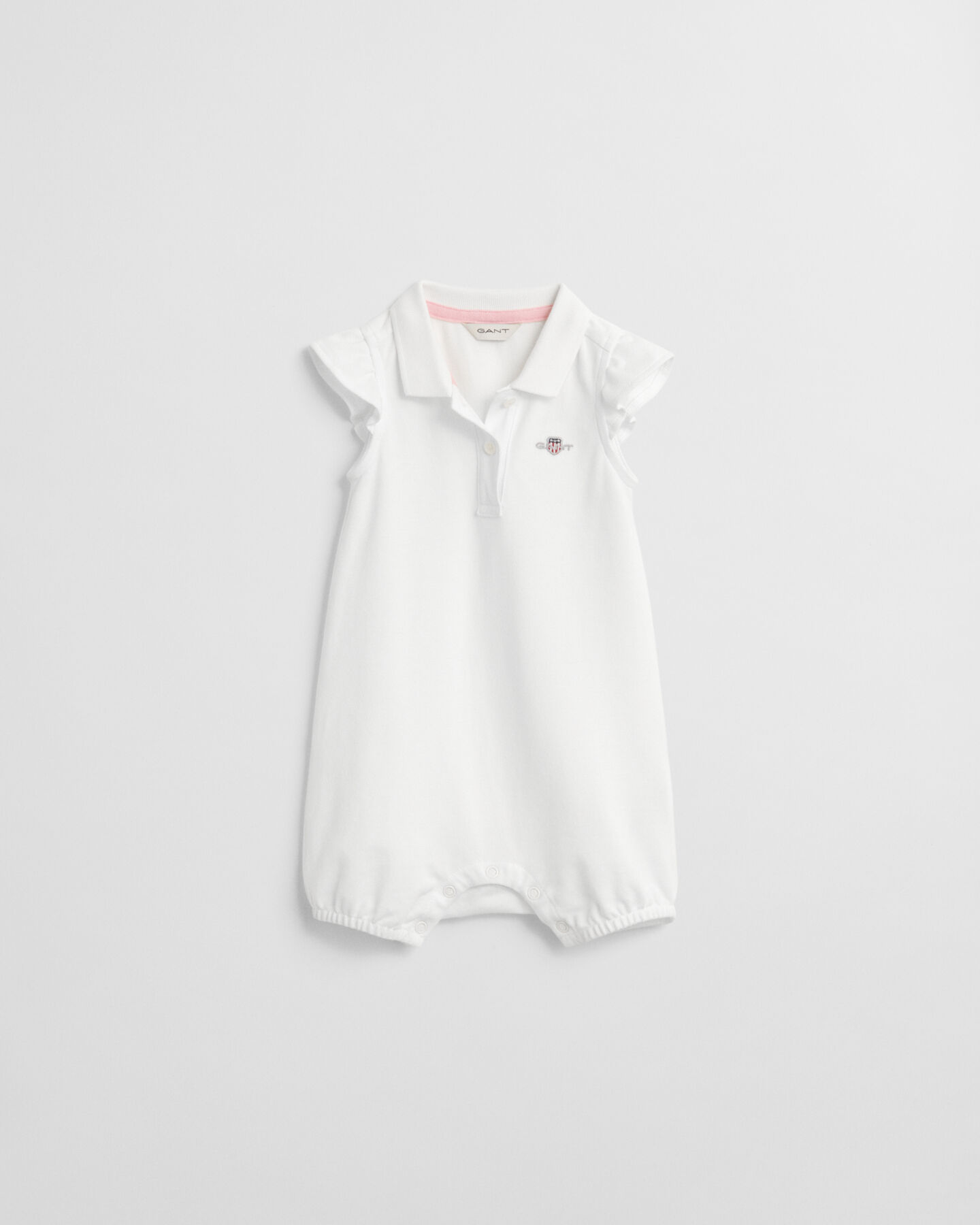 Baby Girl piqu&eacute; rompertje met ruches