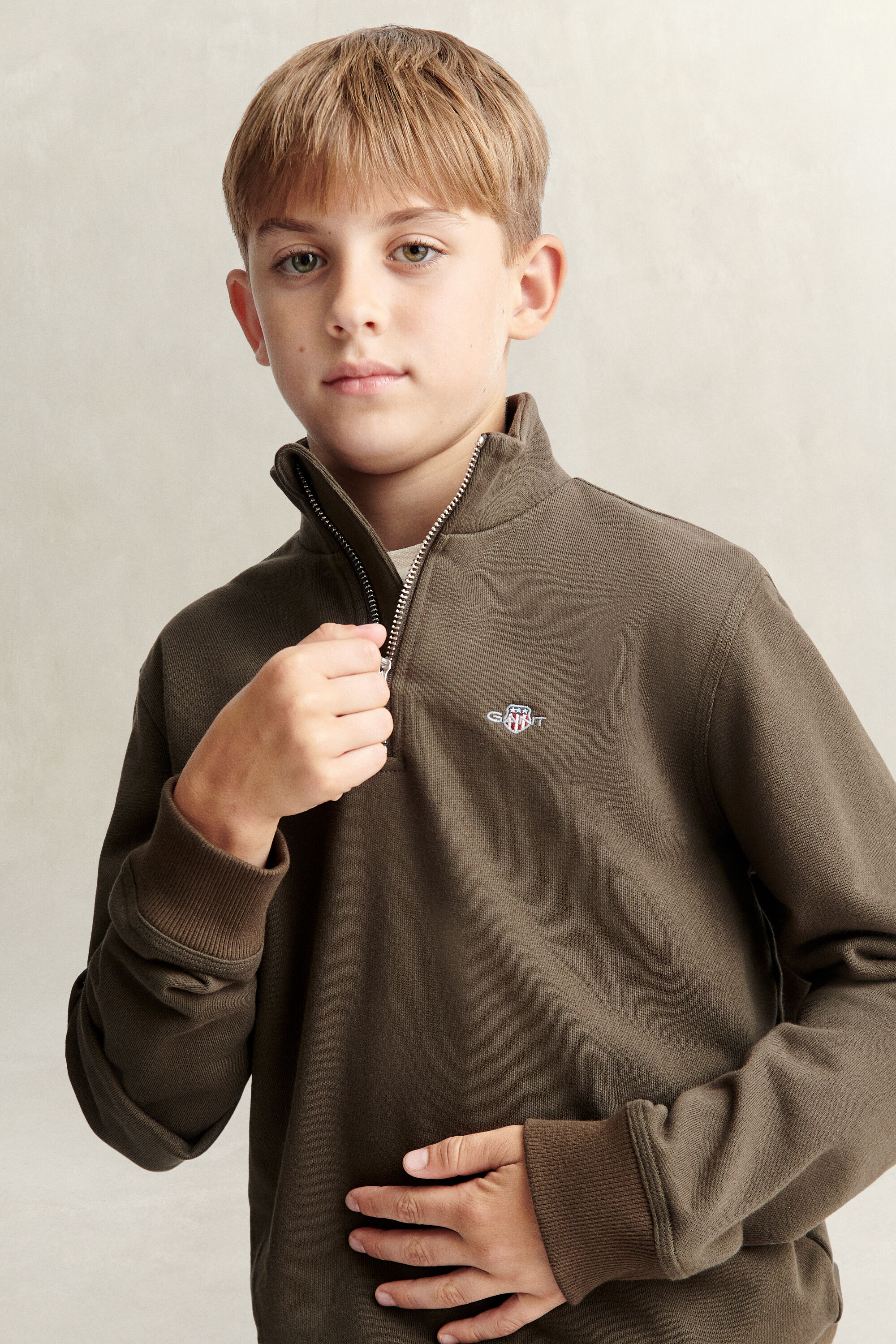 Sweatshirt met korte rits en schild voor tienerjongens