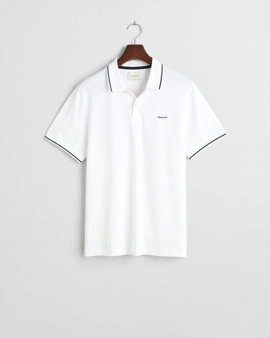 Piqu&eacute; poloshirt met randdetails