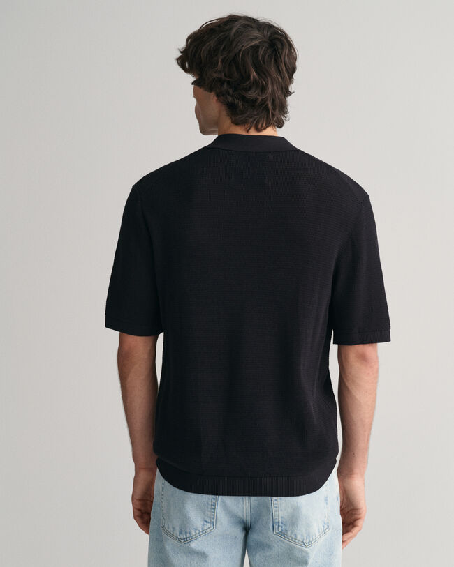 Open gebreide polotrui