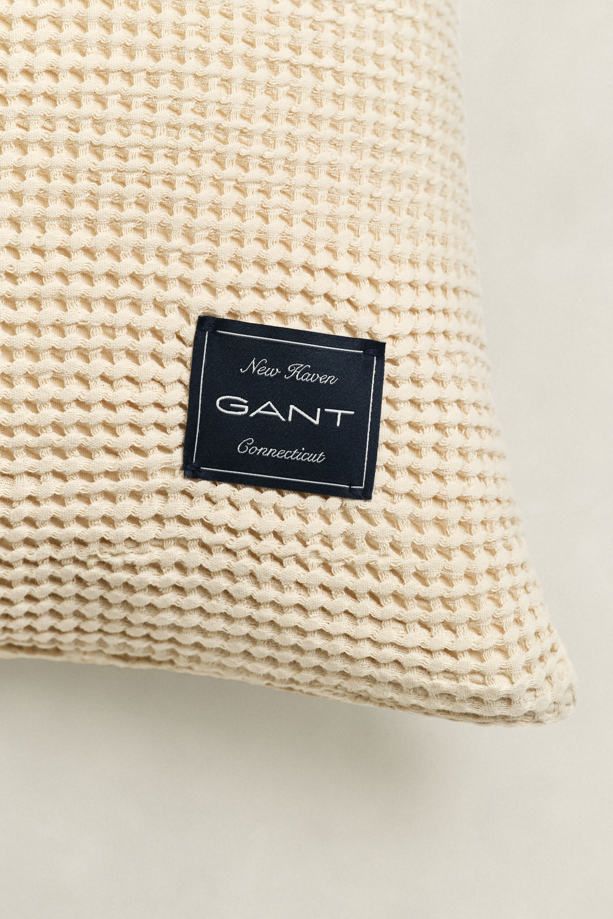 Katoenen kussensloop met wafeltextuur