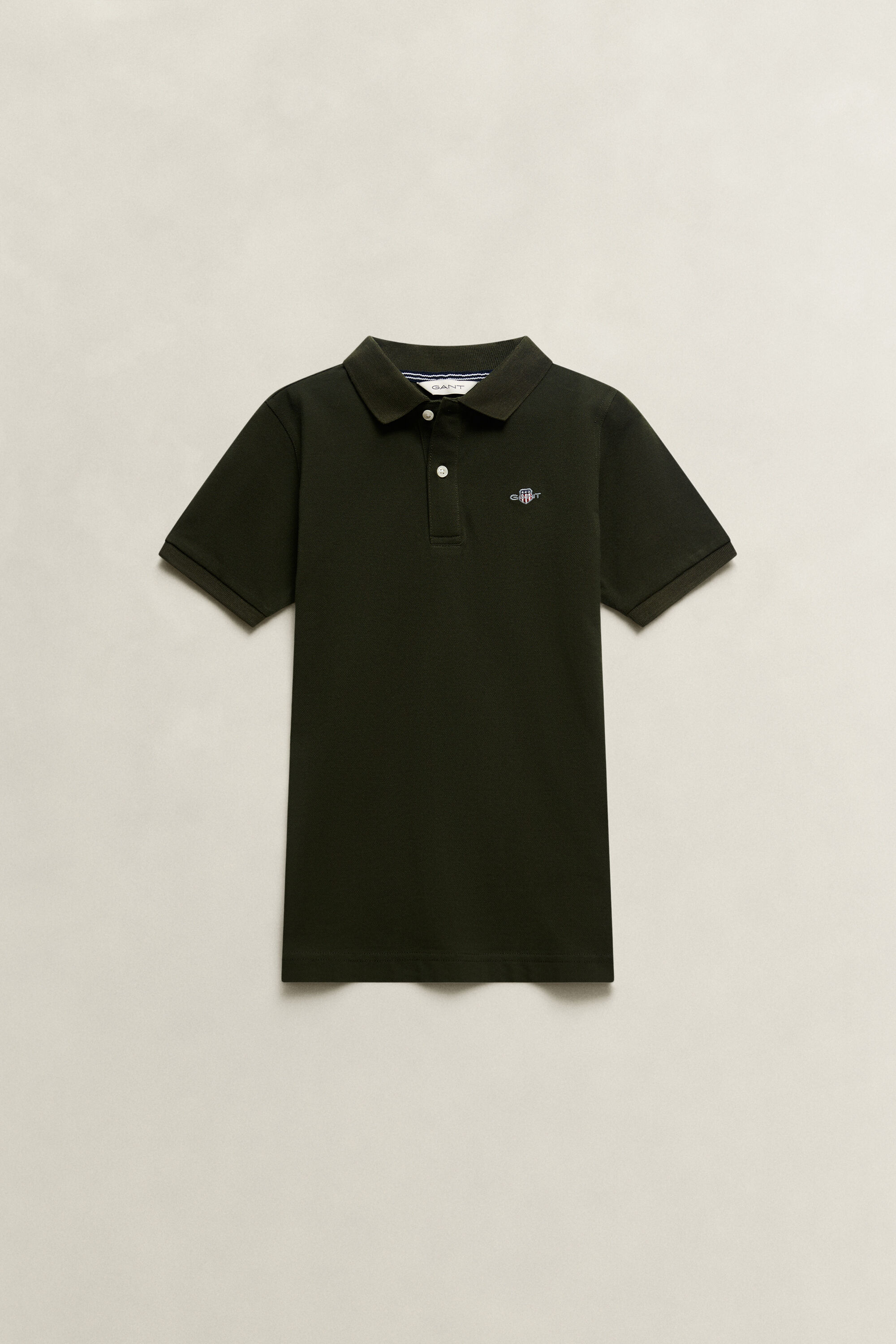 Poloshirt met schild voor tieners