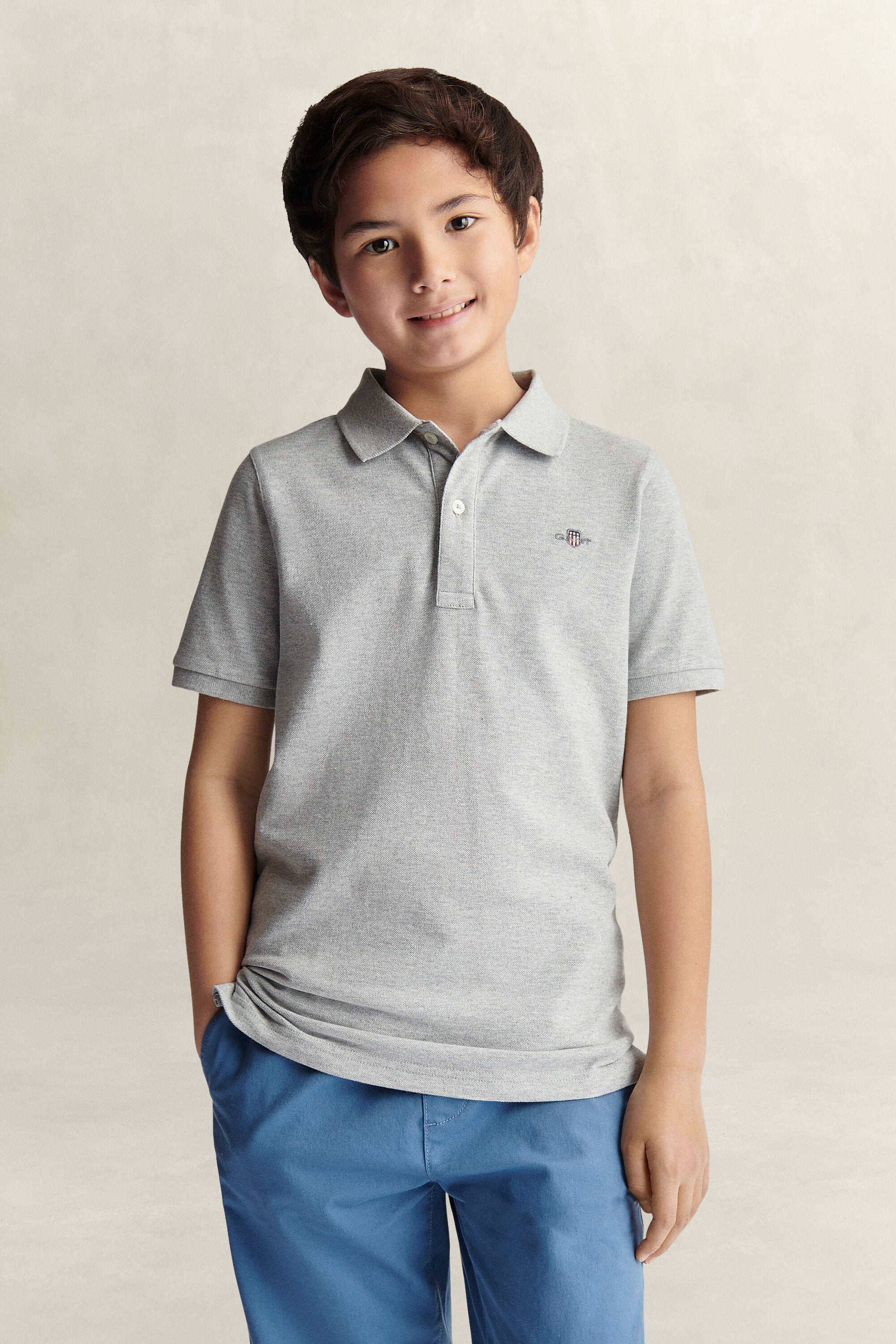 Poloshirt met schild voor tieners