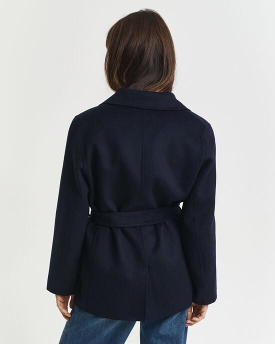 Met de hand gestikte jasje met ceintuur