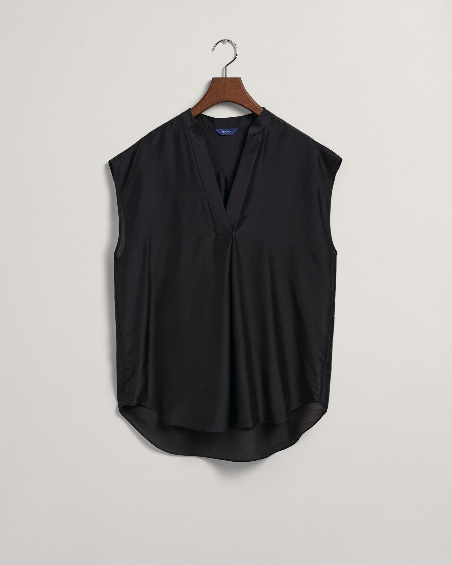 Mouwloze blouse met opstaande kraag