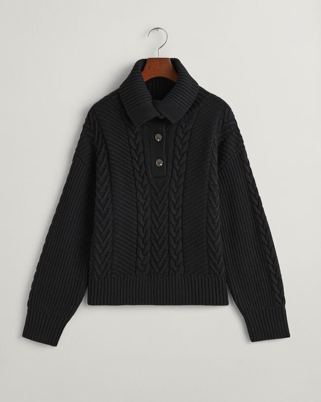 Gebreide coltrui met kabels en knopen
