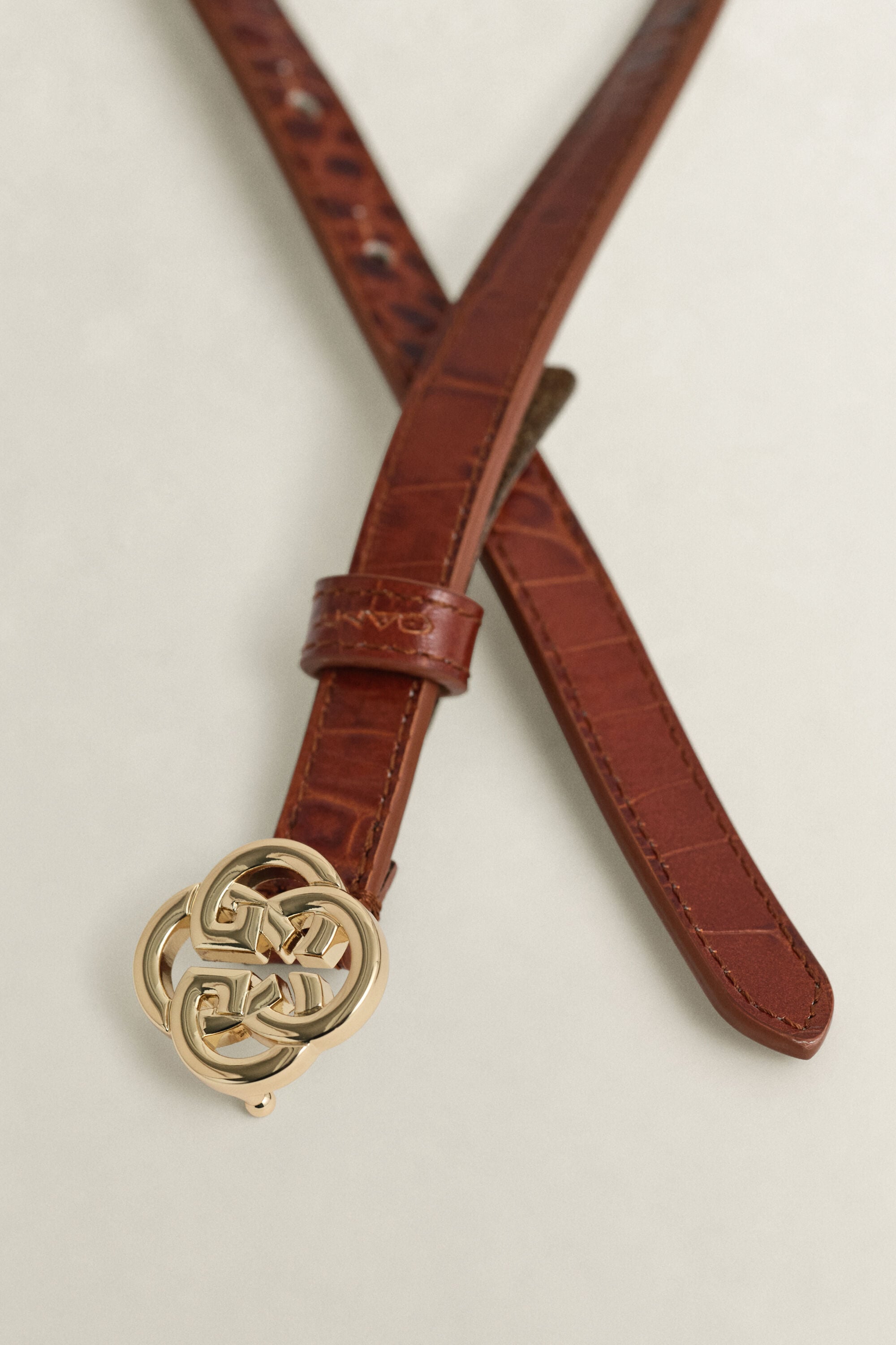 Riem met krokodillenlook en monogram