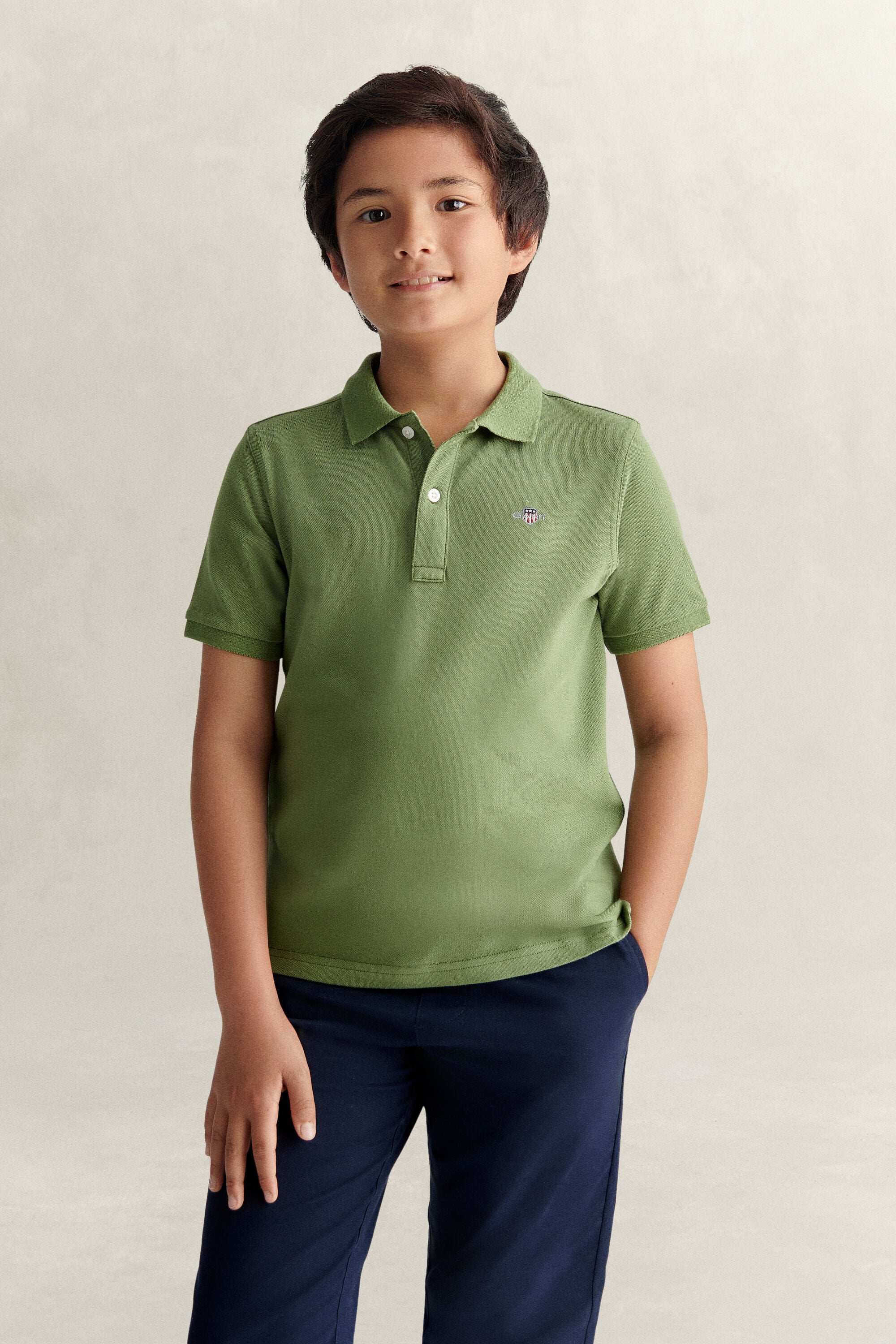 Poloshirt met schild voor tieners