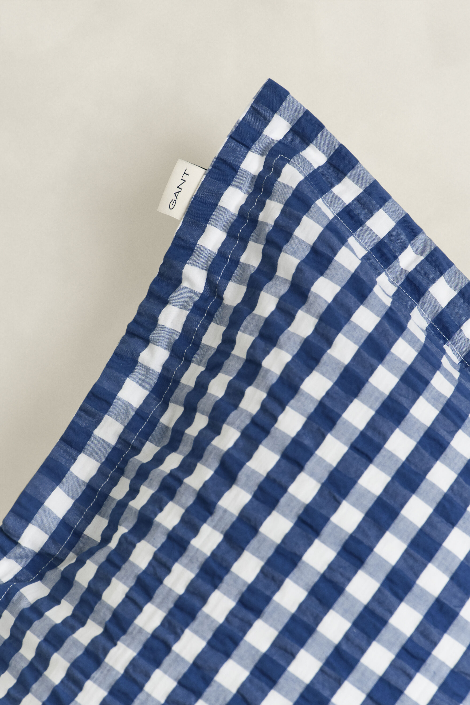 Geruit kussensloop van seersucker