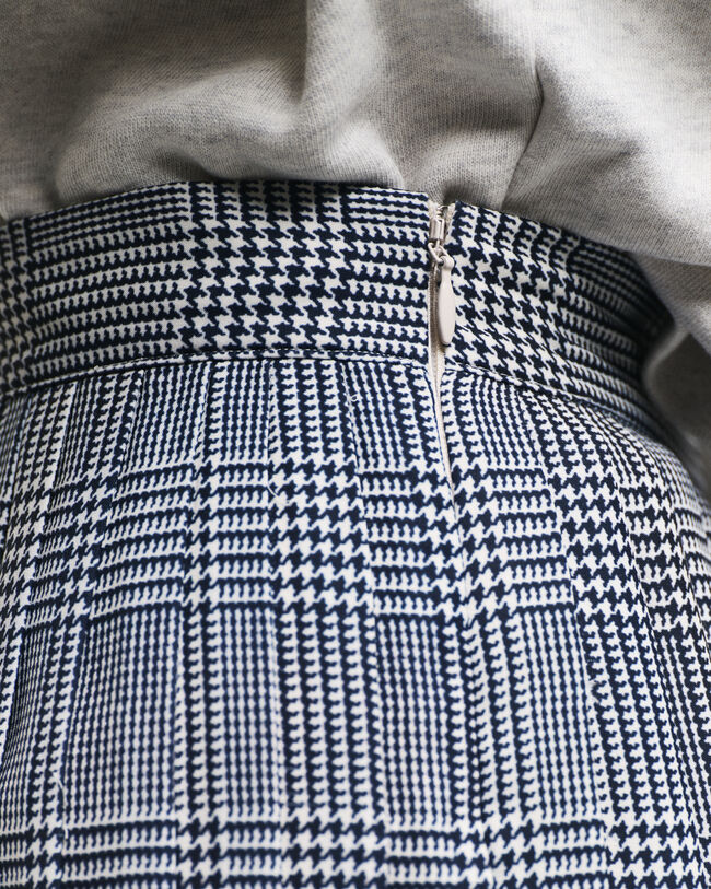 Plooirok met ruitjesprint