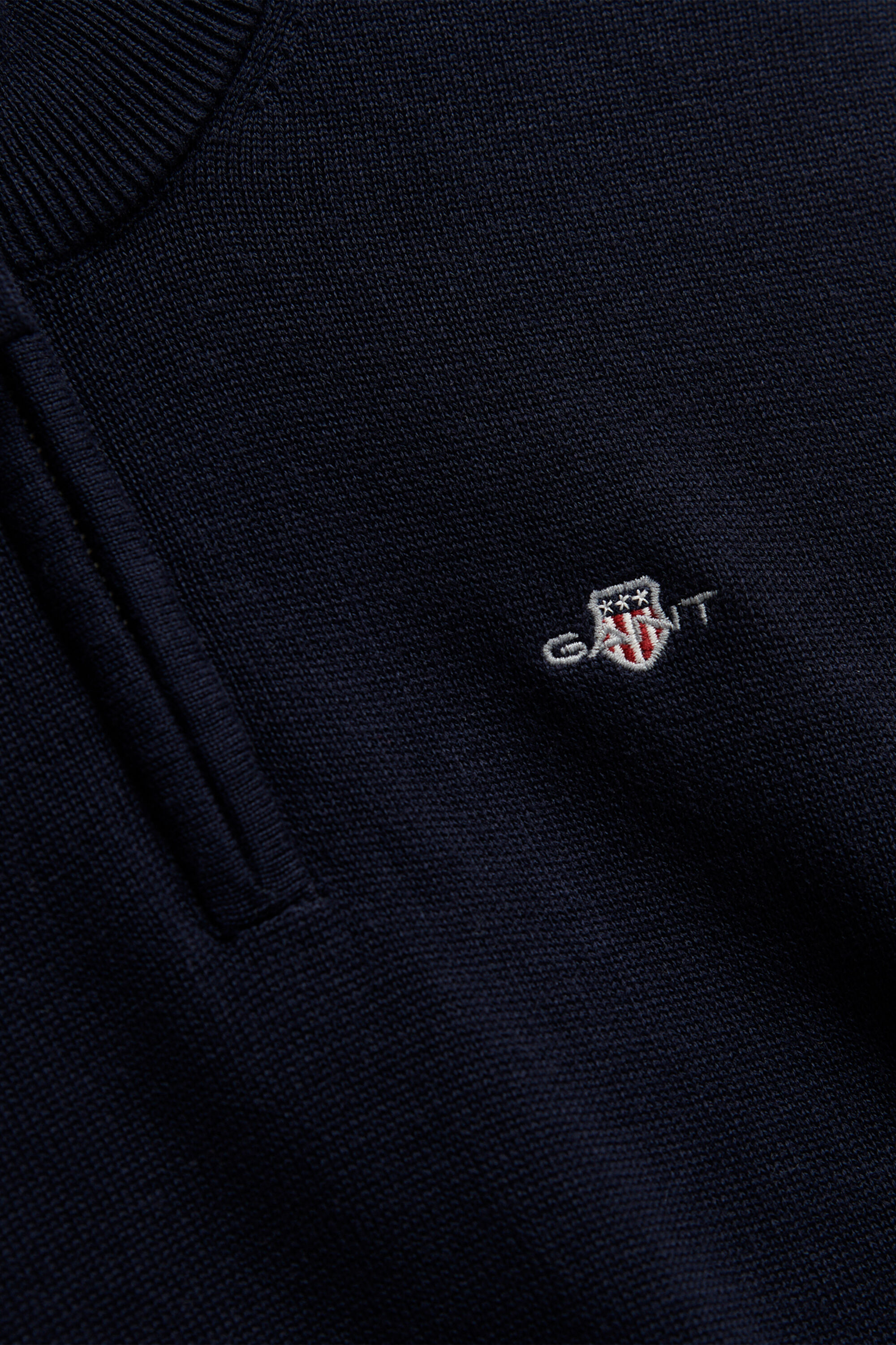 Sweater met korte rits en schild voor tienerjongens