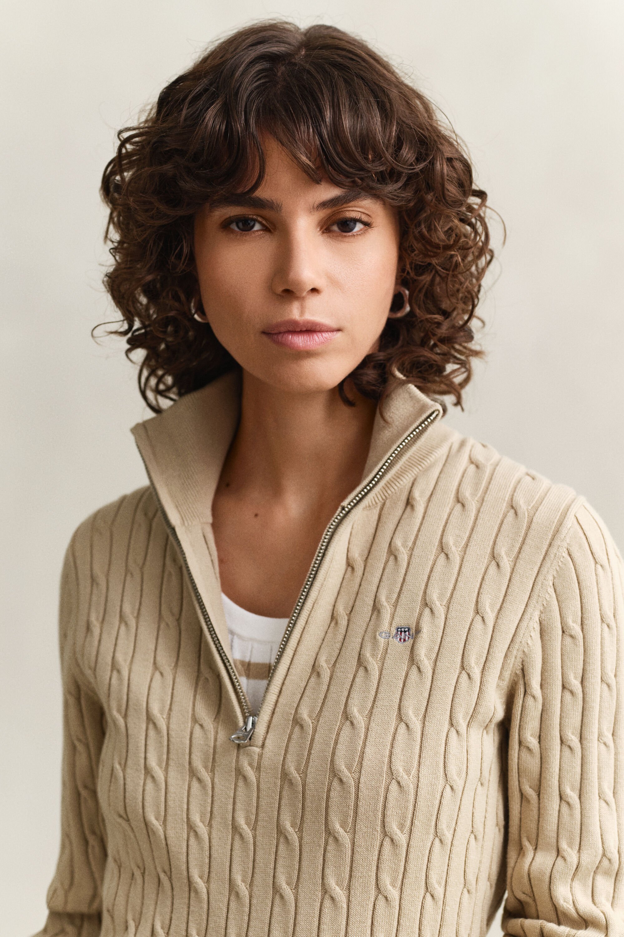 Gebreide kabeltrui met korte rits