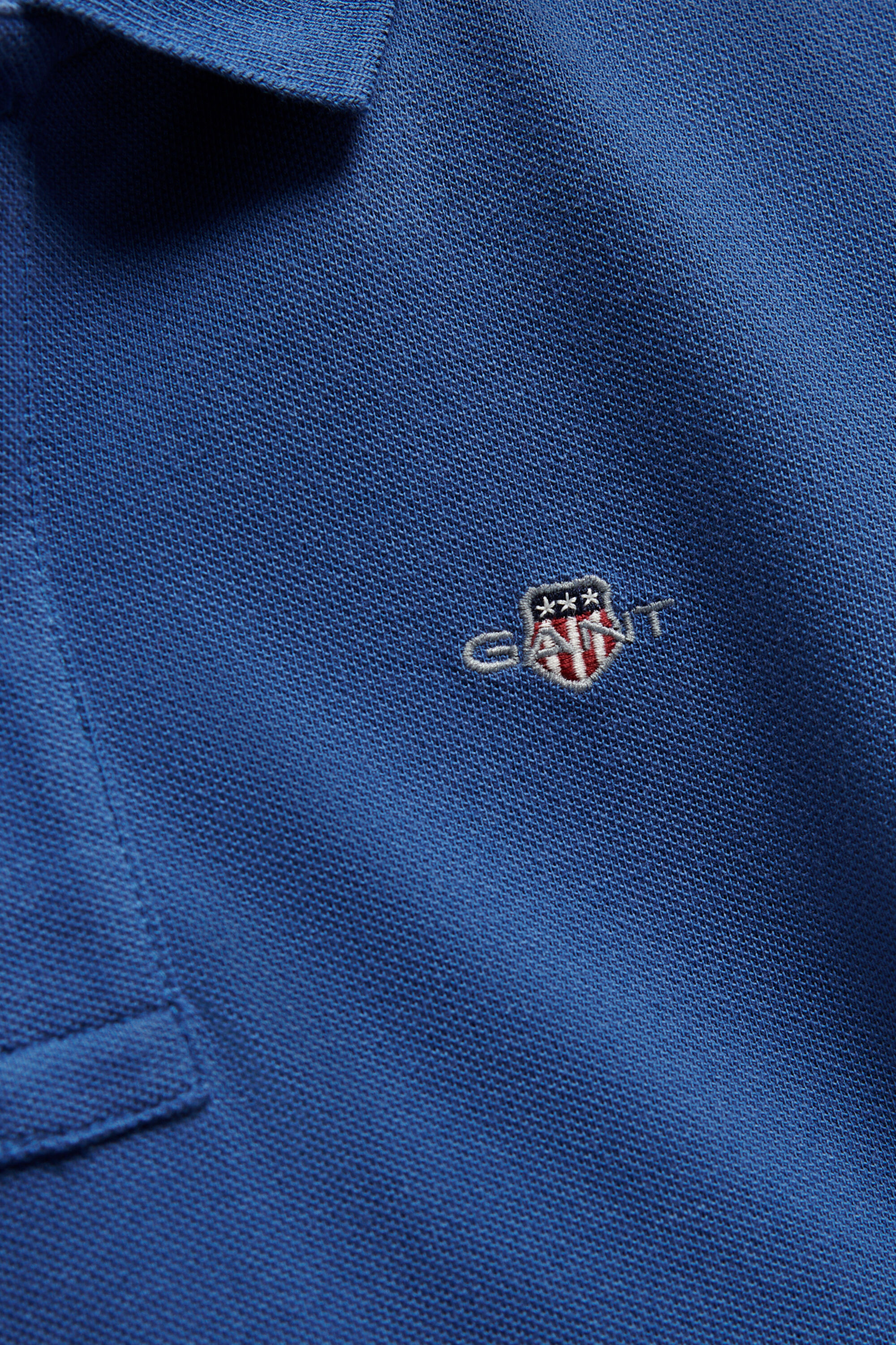 Teens Shield piqué poloshirt