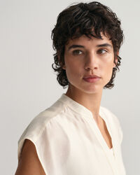 Mouwloze blouse met opstaande kraag