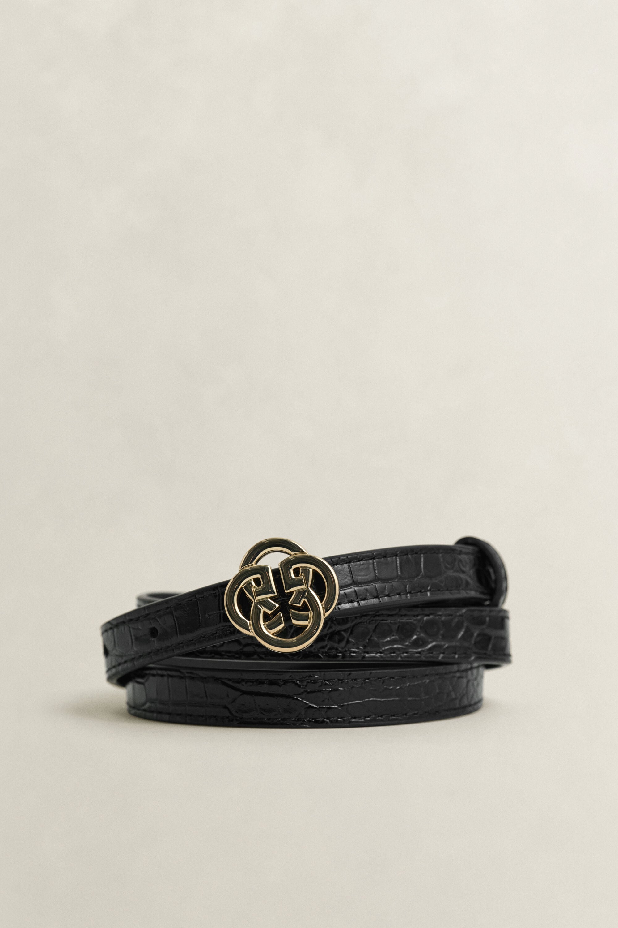 Riem met krokodillenlook en monogram