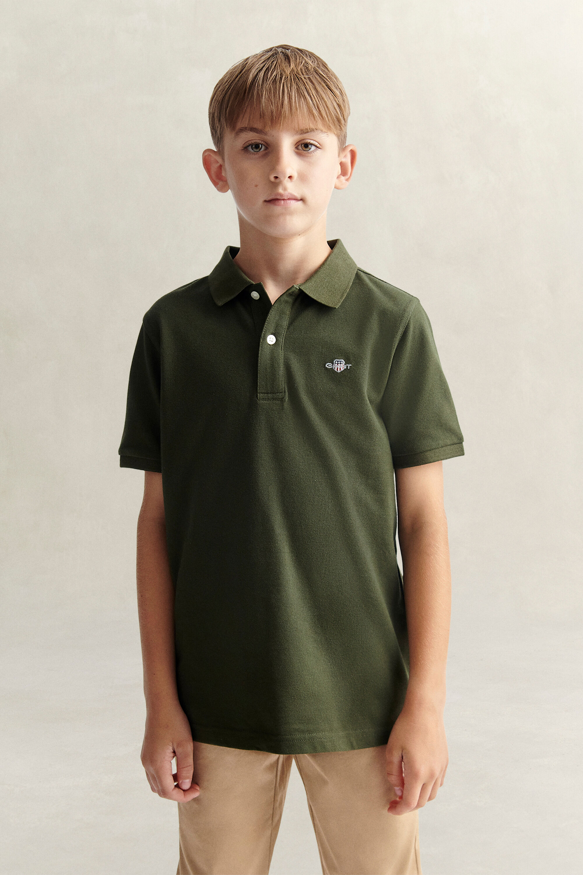 Poloshirt met schild voor tieners
