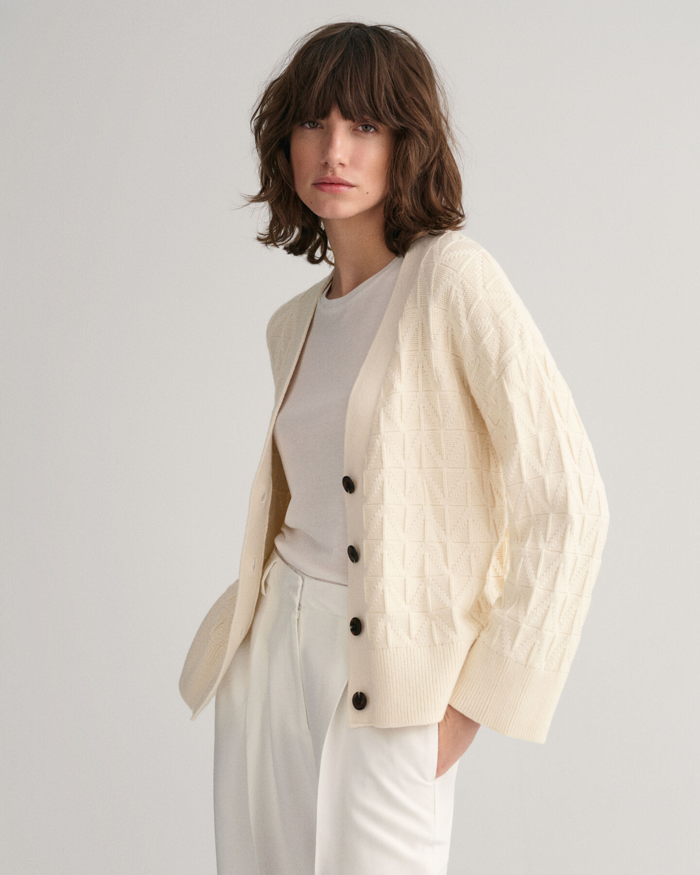 Vest met V-hals en visgraatmotief